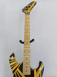 6-string electric guitar, maple fingerboard, zebra striped guitar body